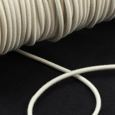 Cordón goma elástica 3.5 mm, redondo, algodón-caucho natural biodegradable color crudo - rollo 100 mts