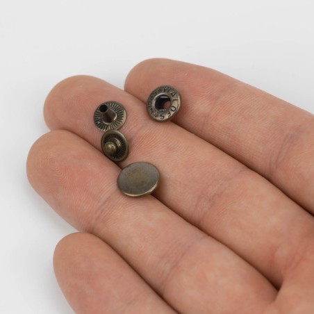 Mini broche presión Olimpia 200 Latón oro pavonado - Caja 1000 uds