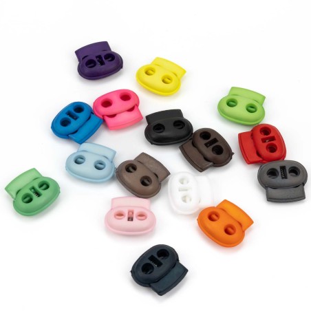 Tope tensor cordón plástico doble agujero 22 x 23 mm