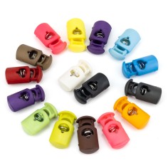 Tope tensor cordón plástico alargado 24 x 17 mm