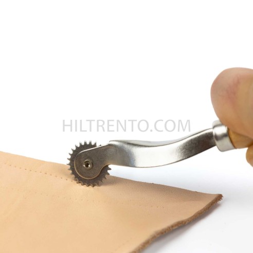 Ruleta pequeña marcar puntos de costura en...