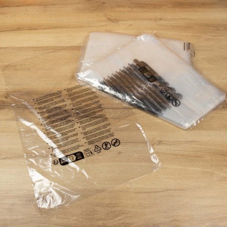 Bolsa transparente texto seguridad normativa europea perforada 40x60 cm - Pack 100 uds