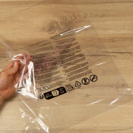 Bolsa transparente texto seguridad normativa europea perforada 40x60 cm - Pack 100 uds