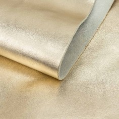 Piel napa vacuno laminada metalizada, color dorado...